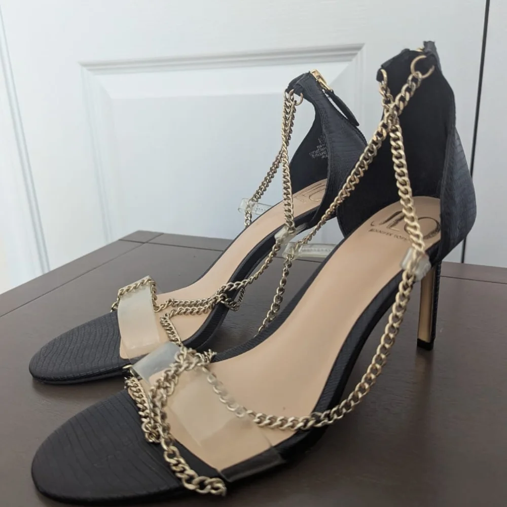 Jennifer Lopez Black Heels with Gold Chain Accents